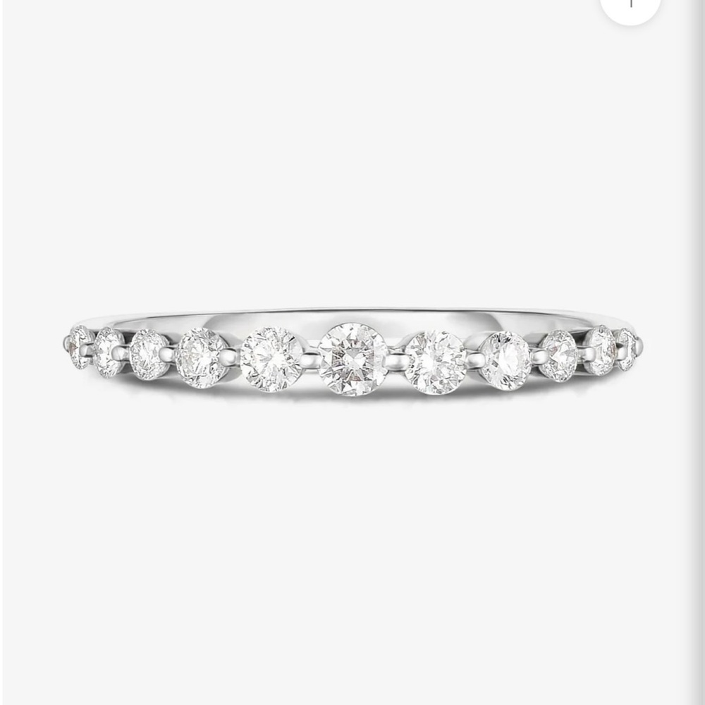 Ring Concierge Graduated Single Prong Diamond Ring